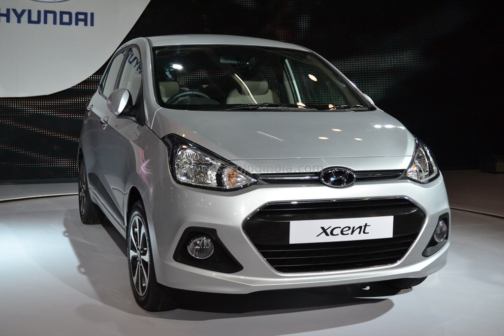 http://www.carblogindia.com/wp-content/uploads/2014/02/2014-Hyundai-Xcent-Front-Right-Quarter1.jpg