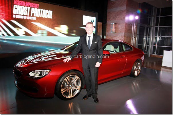 Dr Andreas Schaaf, President, BMW India with the new BMW 6 Series Coupe 121011