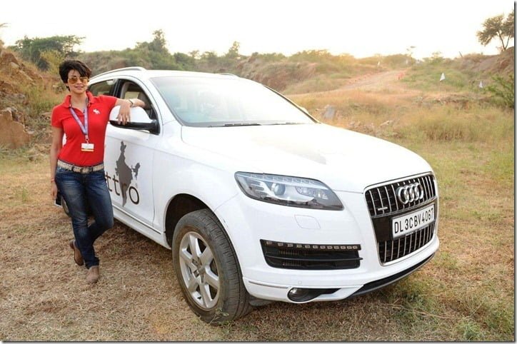 Audi Women's Power Drive- Actress Gul Panag posing beside Audi Q7