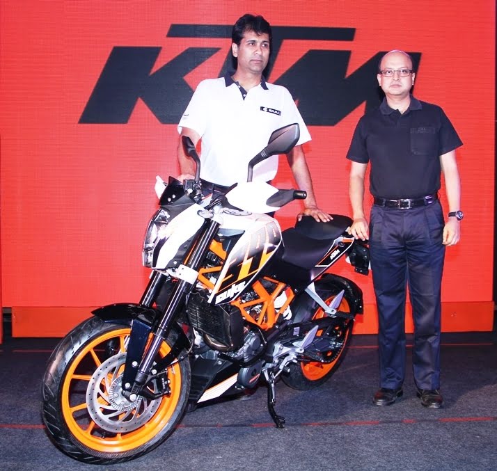 Mr. Rajiv Bajaj, MD, Bajaj Auto Ltd and Mr. Amit Nandi, VP, Probiking, Bajaj Auto Ltd. with the KTM Duke 390Mr. Rajiv Bajaj, MD, Bajaj Auto Ltd and Mr. Amit Nandi, VP, Probiking, Bajaj Auto Ltd. with the KTM Duke 390Mr. Rajiv Bajaj, MD, Bajaj Auto Ltd and Mr. Amit Nandi, VP, Probiking, Bajaj Auto Ltd. with the KTM Duke 390