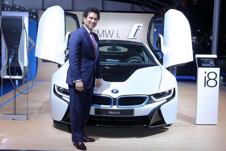 Sachin Tendulkar with the BMW i8 at the Auto Expo 2014