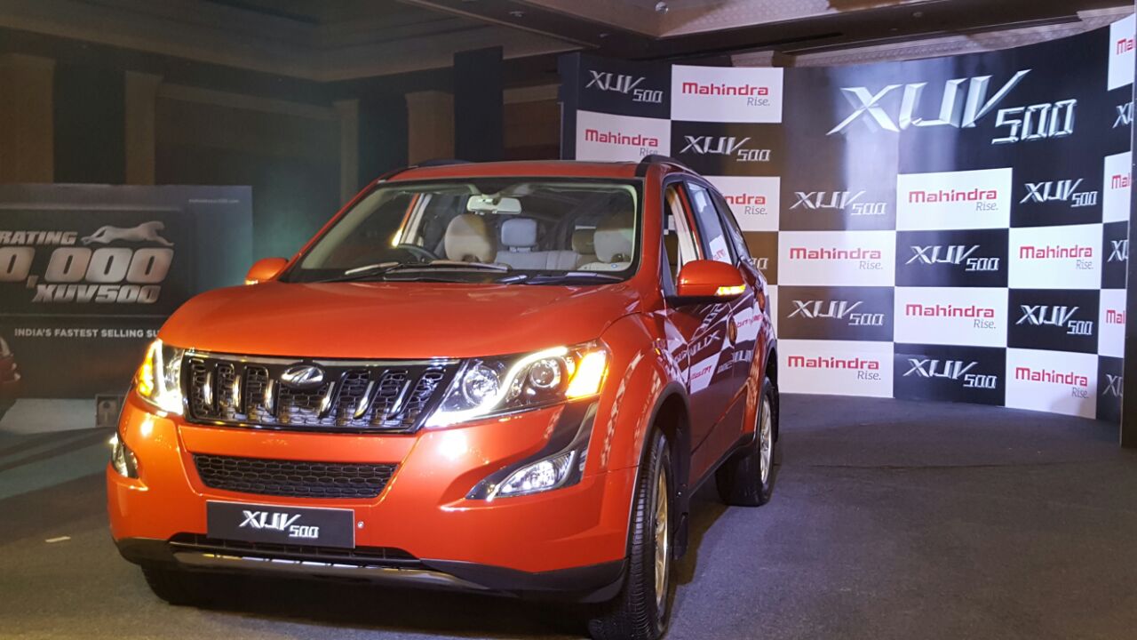 Mahindra xuv 500 images in red colour dress Mahindra xuv 500 images in red colour dress