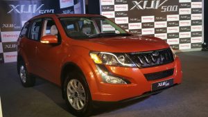 mahindra-xuv500-new-model-pics-front-angle-sunset-orange