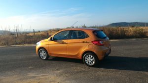 2016-tata-zica-orange-official-media-drive-images-side-angle-rear