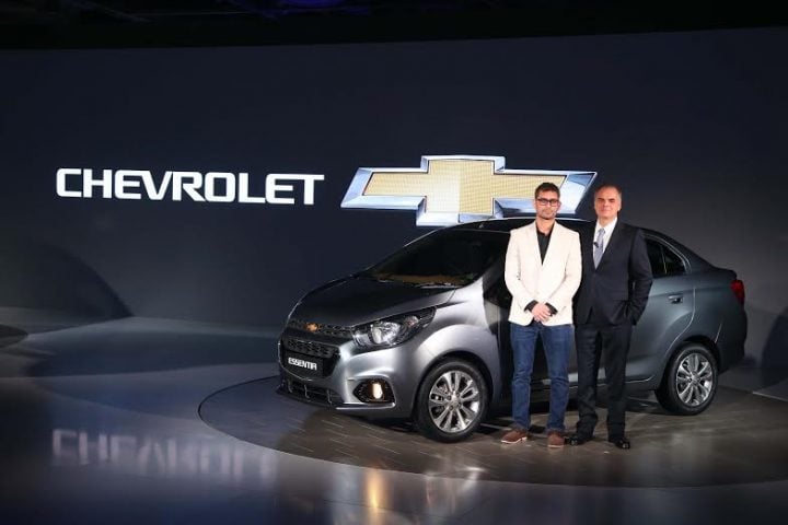 Chevrolet Essentia India Launch, Prices -Front-angle showing bumper, headlights, alloy wheels, doors,grille of Beat compact sedan