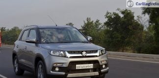 maruti vitara brezza review images front angle silver action