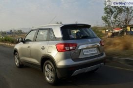 maruti vitara brezza review images side rear angle silver 5