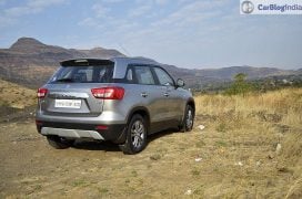 maruti vitara brezza review images rear angle silver 4