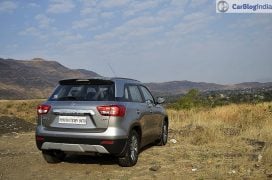 maruti vitara brezza review images rear angle silver 2