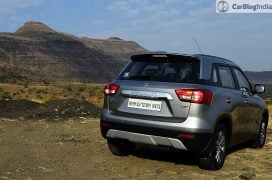 maruti vitara brezza review images rear angle silver 2