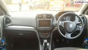 Maruti Vitara Brezza Vs Mahindra Kuv100 Vs Maruti Baleno Vs Hyundai Elite I20 Brezza Dashboard