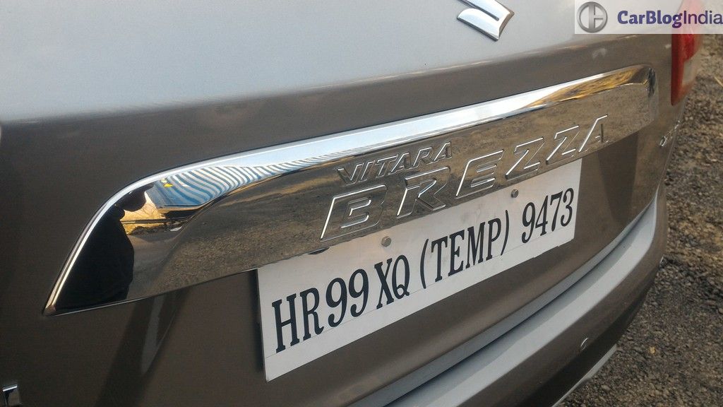 maruti vitara brezza review images badge