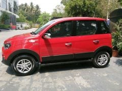 Mahindra nuvosport side profile official images red 2
