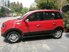 mahindra-nuvosport-side-profile-official-images-red-2