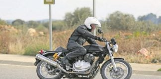 royal enfield 750cc bike images side profile action photo