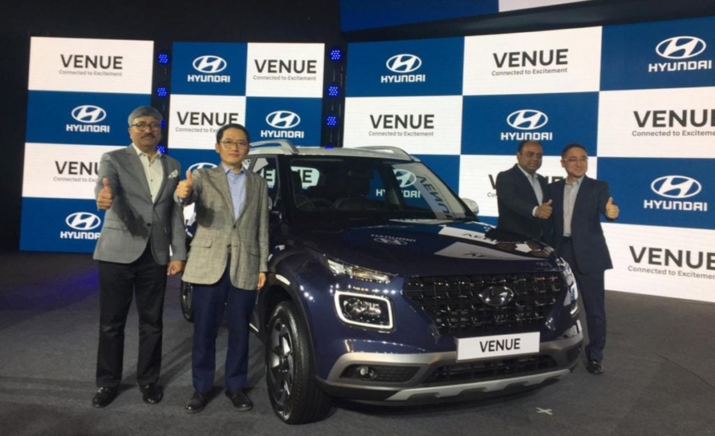 Hyundai Venue at its launch in Delhi along with officials from Hyundai