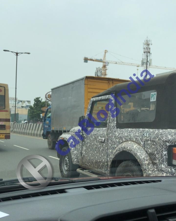 The spotted test mule of the next-gen Thar came with a soft top roof