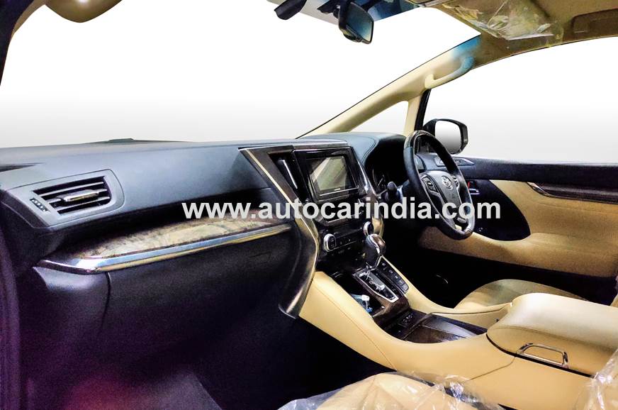 The interiors come draped in dual tone beige and black theme 