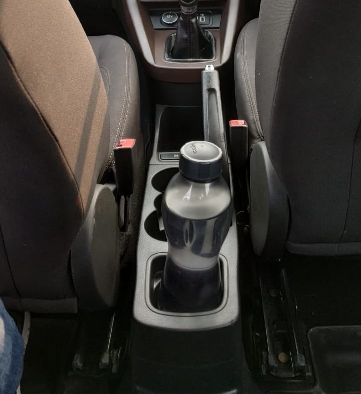 There are quite a few bottle holder and cup holders on the center console.