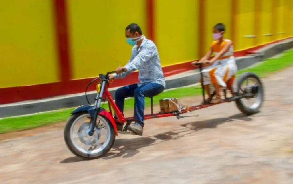 This man from Agartala has built an e-bike that exemplifies social distancing. 