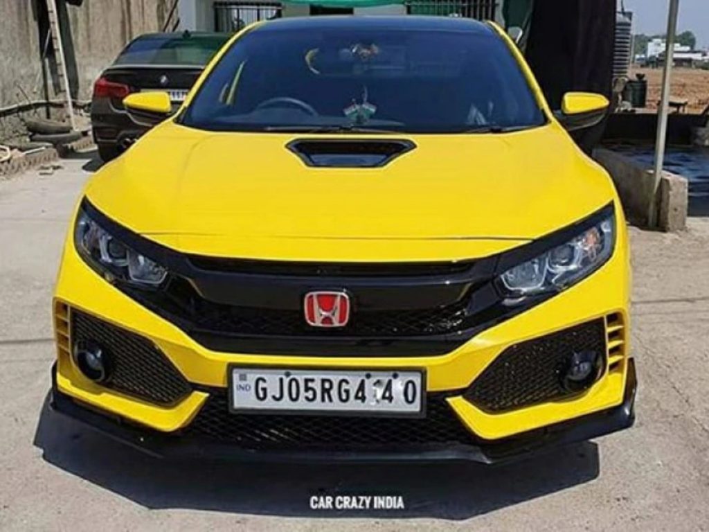 This is a Honda City that has been modified to look like a Type-R.