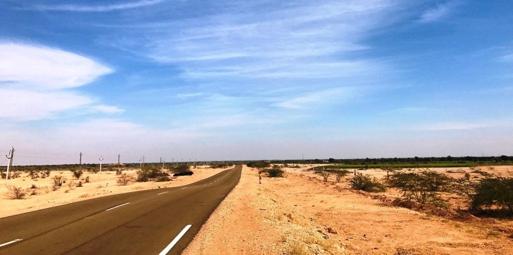Rajasthan has stunning roads with vast expanses of desert stretching on both sides of the road. 