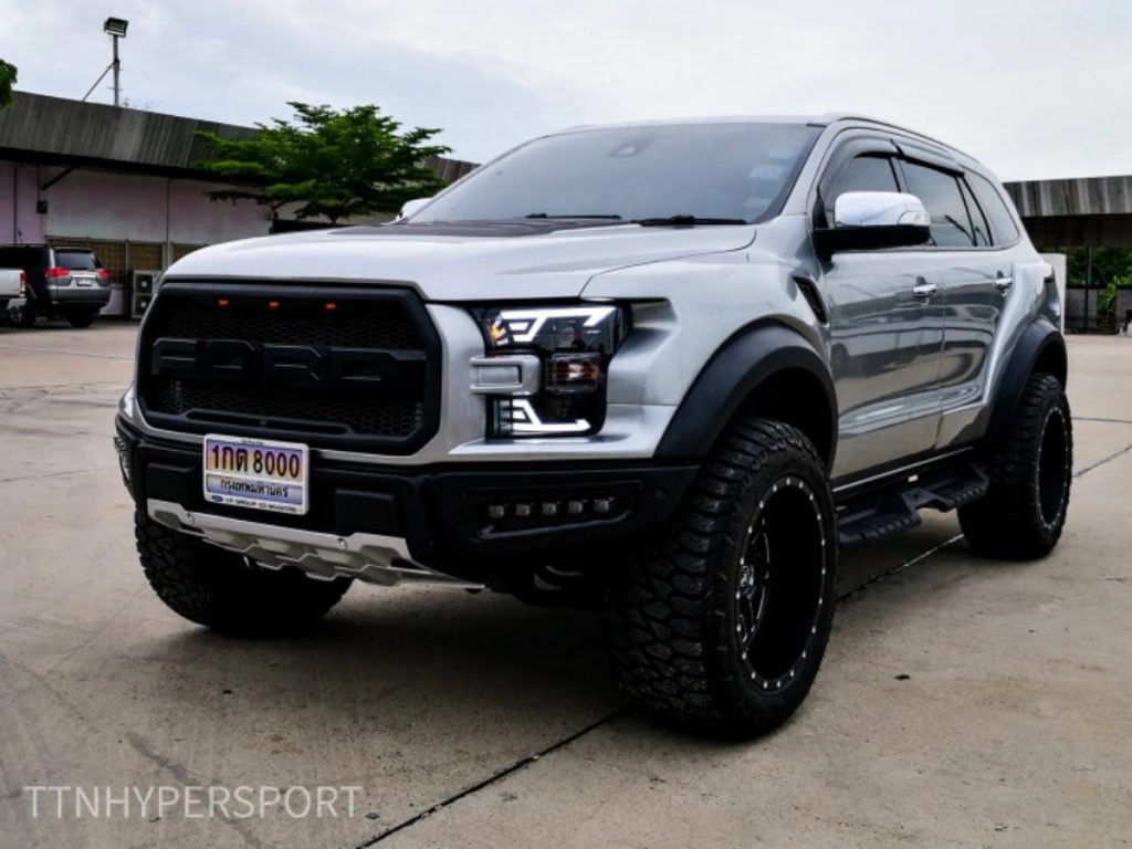 This Ford Endeavor has been modified to look like a Ford F-150 Raptor.