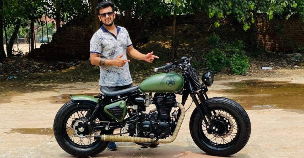 Check out this beautifully modified Royal Enfield with springer forks and a classic bobber look.  