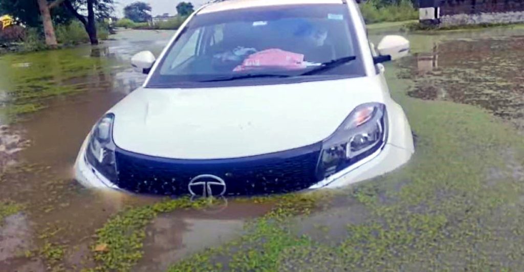 Here's a Tata Nexon that was too ambitions with water wading and got completely stuck.  