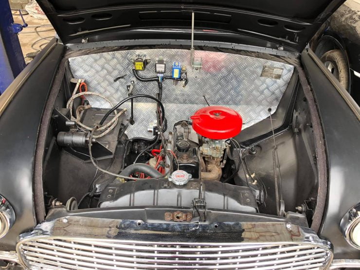 A glimpse inside the engine bay confirms that it too has been restored to eliminate any rust issues. 