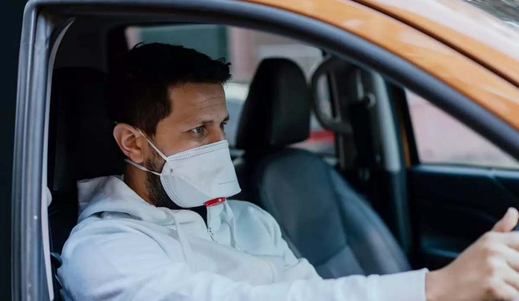 You don't need to be wearing a mask if you are driving alone in your car. 
