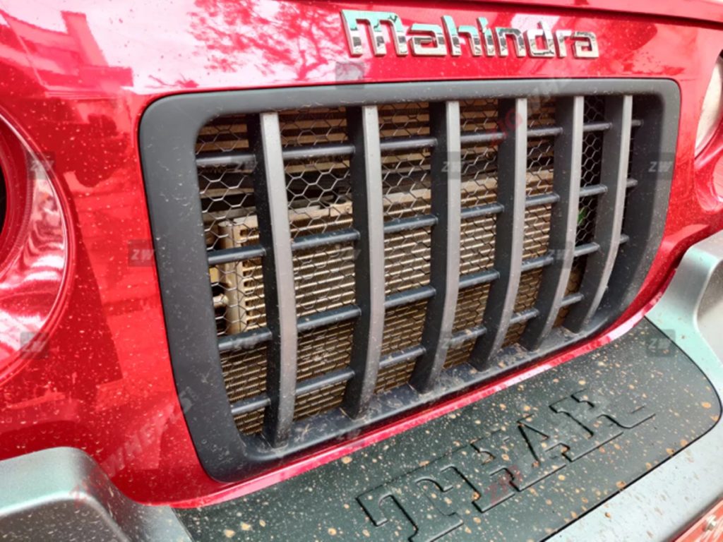 The production-spec Mahindra Thar has been spotted with a honeycomb mesh behind its slatted grille. 