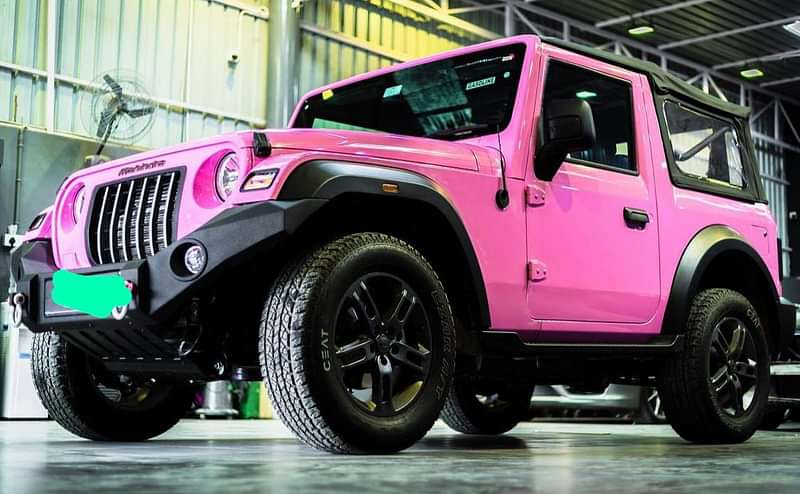 pink mahindra thar front three-quarters