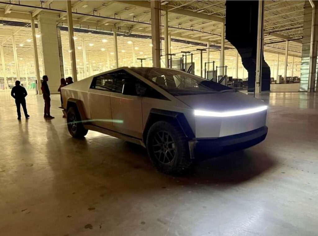 production spec tesla cybertruck front three quarters