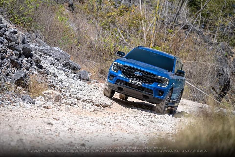 2022 ford endeavour images blue front three quarters off roading