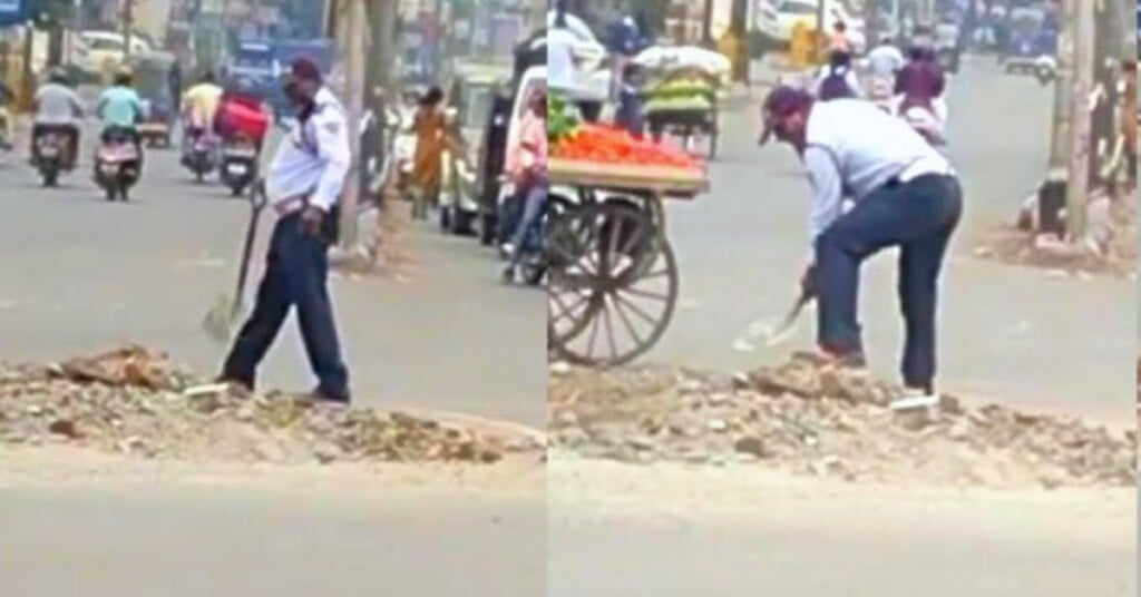 traffic policeman clears rubbles