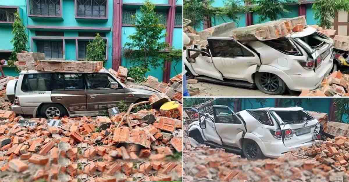 brick wall collapses on Mitsubishi Pajero and Toyota Fortuner