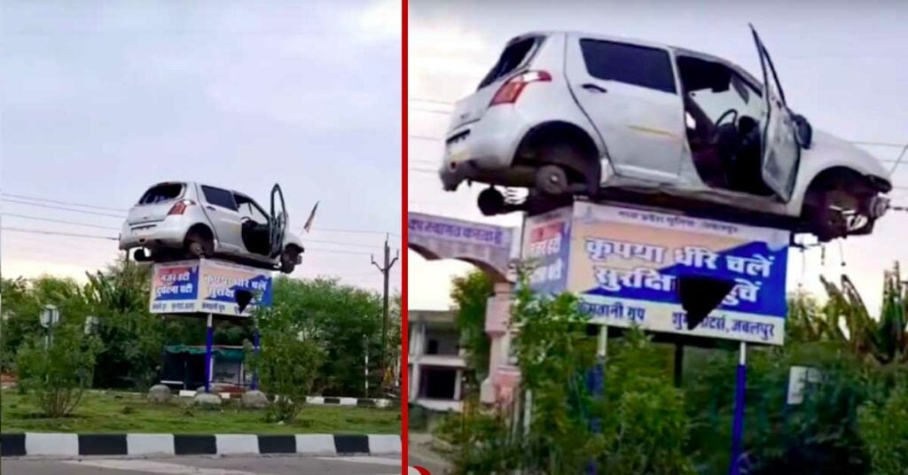 maruti swift hanging on poles jabalpur police