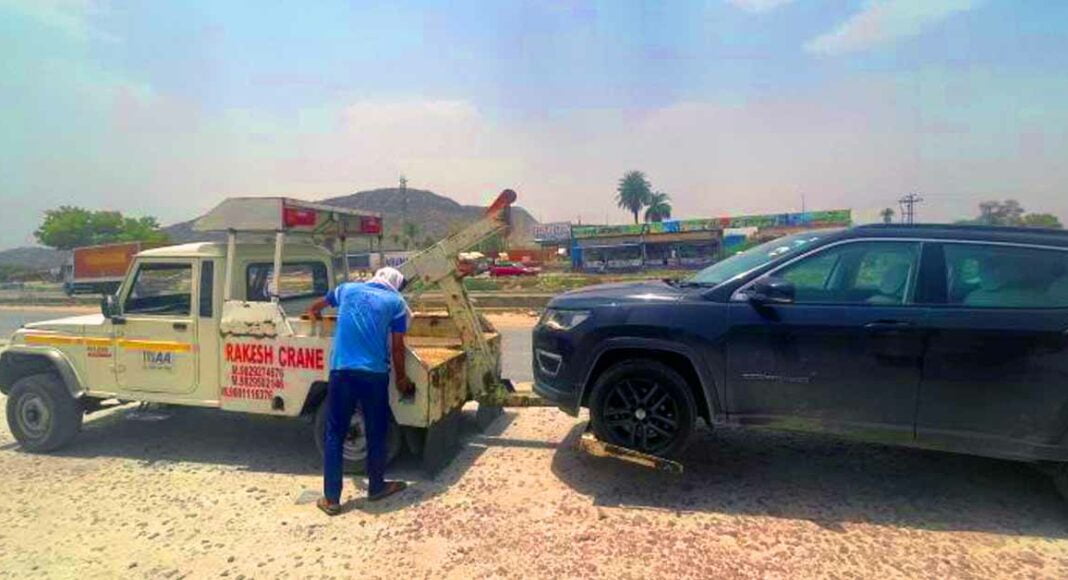 broken down jeep compass towed by rsa