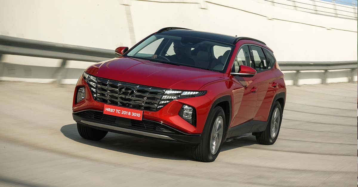 new hyundai tucson fiery red front three quarters