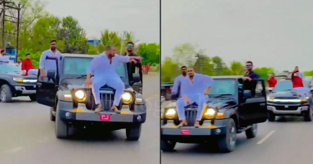 Man Rides on Mahindra Thar Bonnet