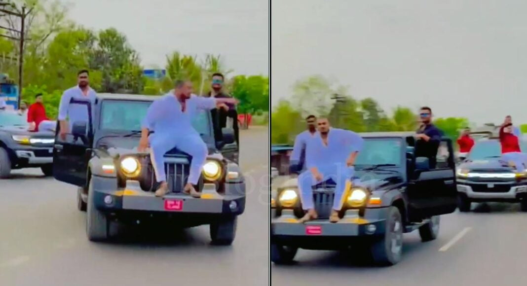 man rides on mahindra thar bonnet