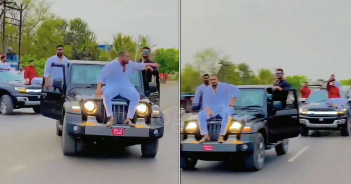 man rides on mahindra thar bonnet