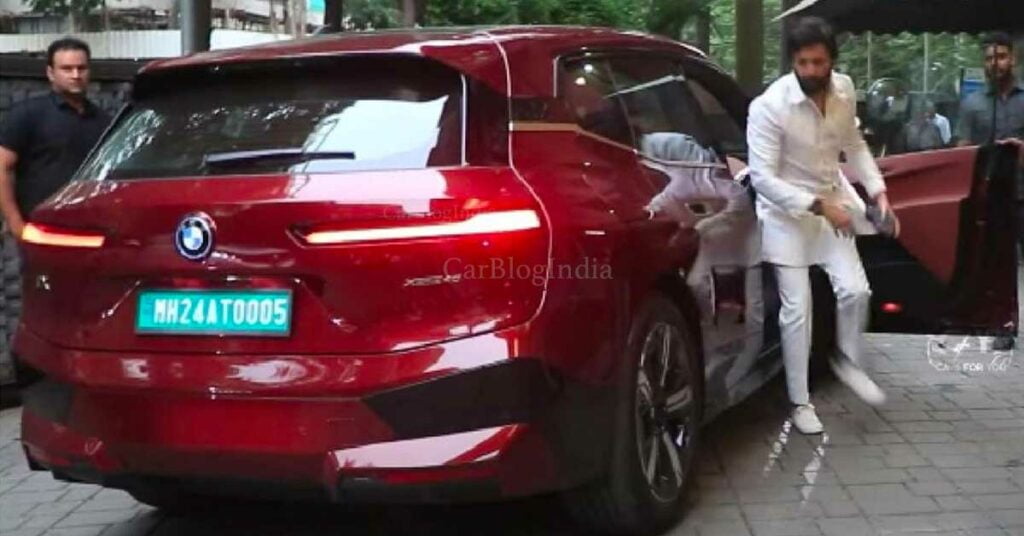 Riteish Deshmukh with his new BMW iX electric SUV.