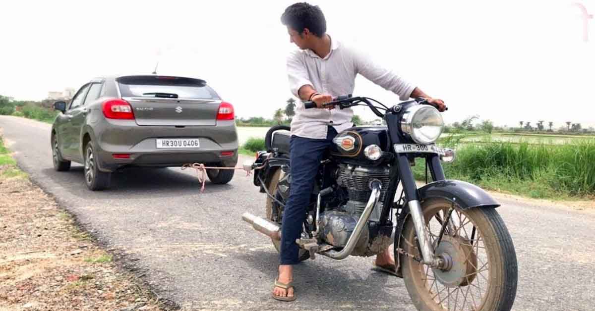 Royal Enfield Bullet 350 towing a Maruti Baleno