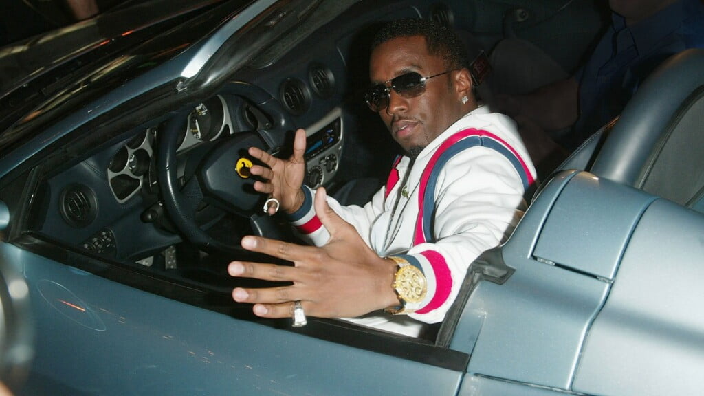 Sean Daddy Combs in his Ferrari 360 Modena Spyder