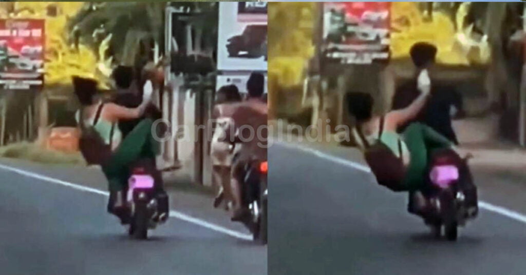 girl kicks biker falls herself