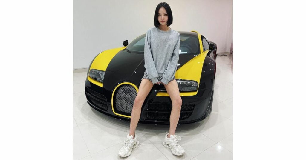 Kim Lim with her Bugatti Veyron