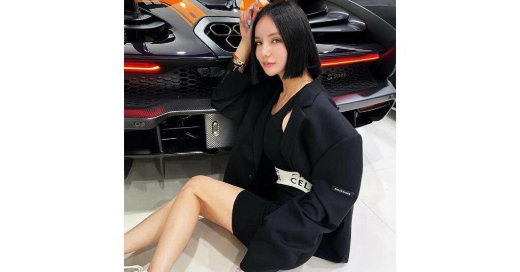 Kim Lim with her Lamborghini Aventador