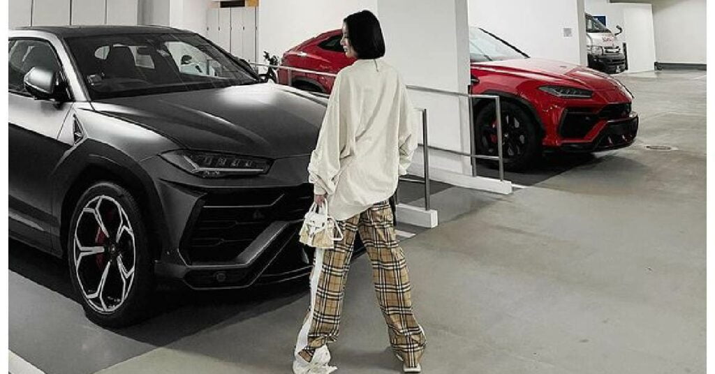 Kim Lim with her Lamborghini Urus